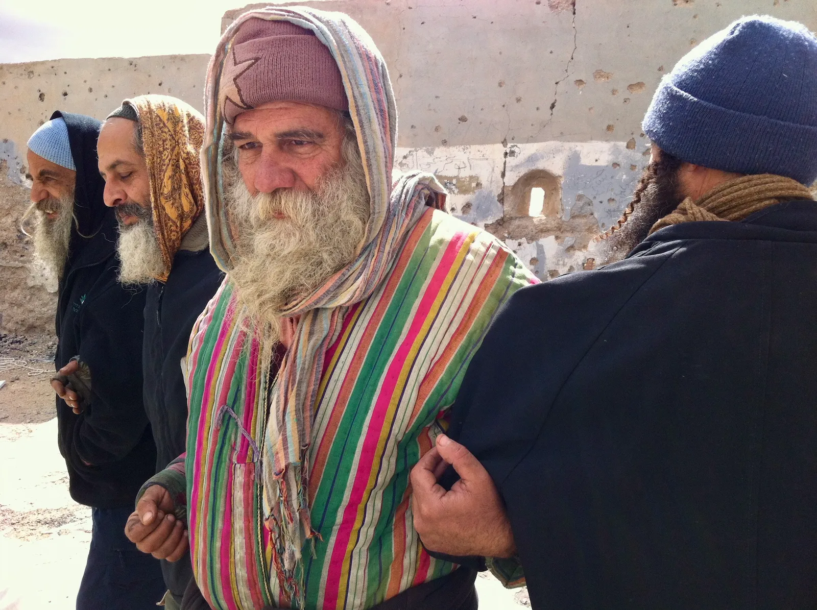 Oran Benron singing with friends at abandoned Jordanian police station, Judean Desert