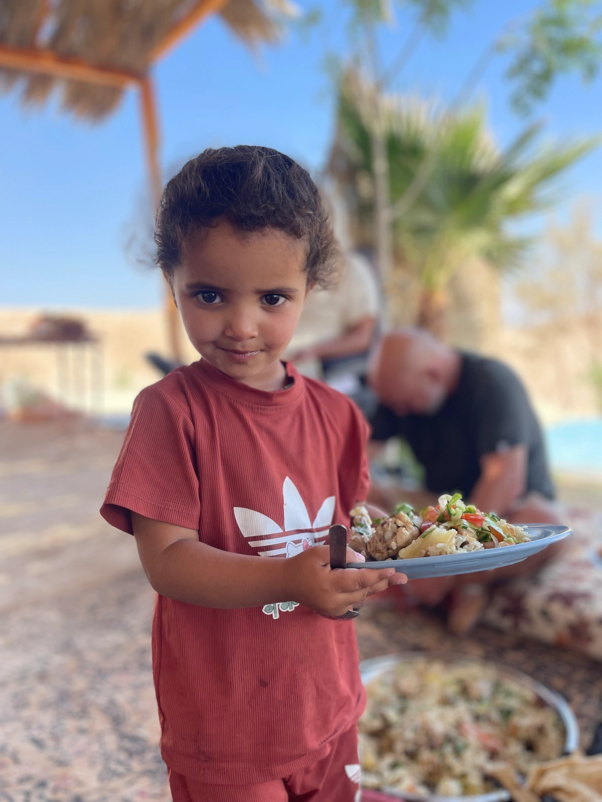 Rashayda Bedouin girl with food