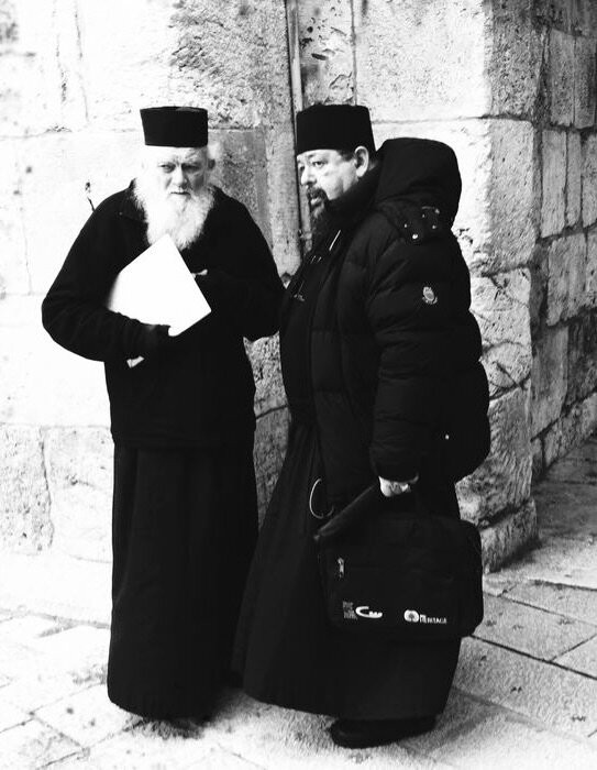 Two Greek Orthodox priests walking together, Old City, Jerusalem