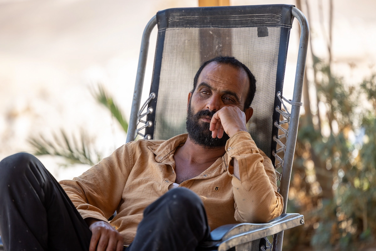 Farhan, Bedouin host, resting in chair at Rashayda camp, Judean Desert