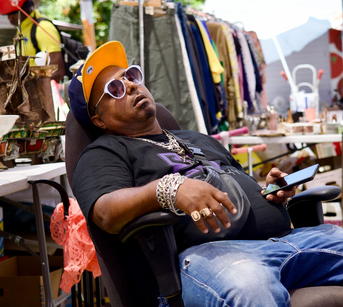Vendor napping at Shuk Hapishpeshim flea market, Jaffa