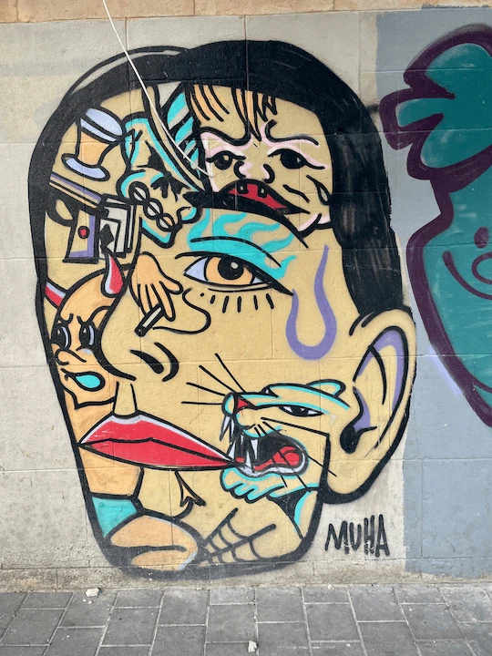 Street art by MUHA, South Tel Aviv